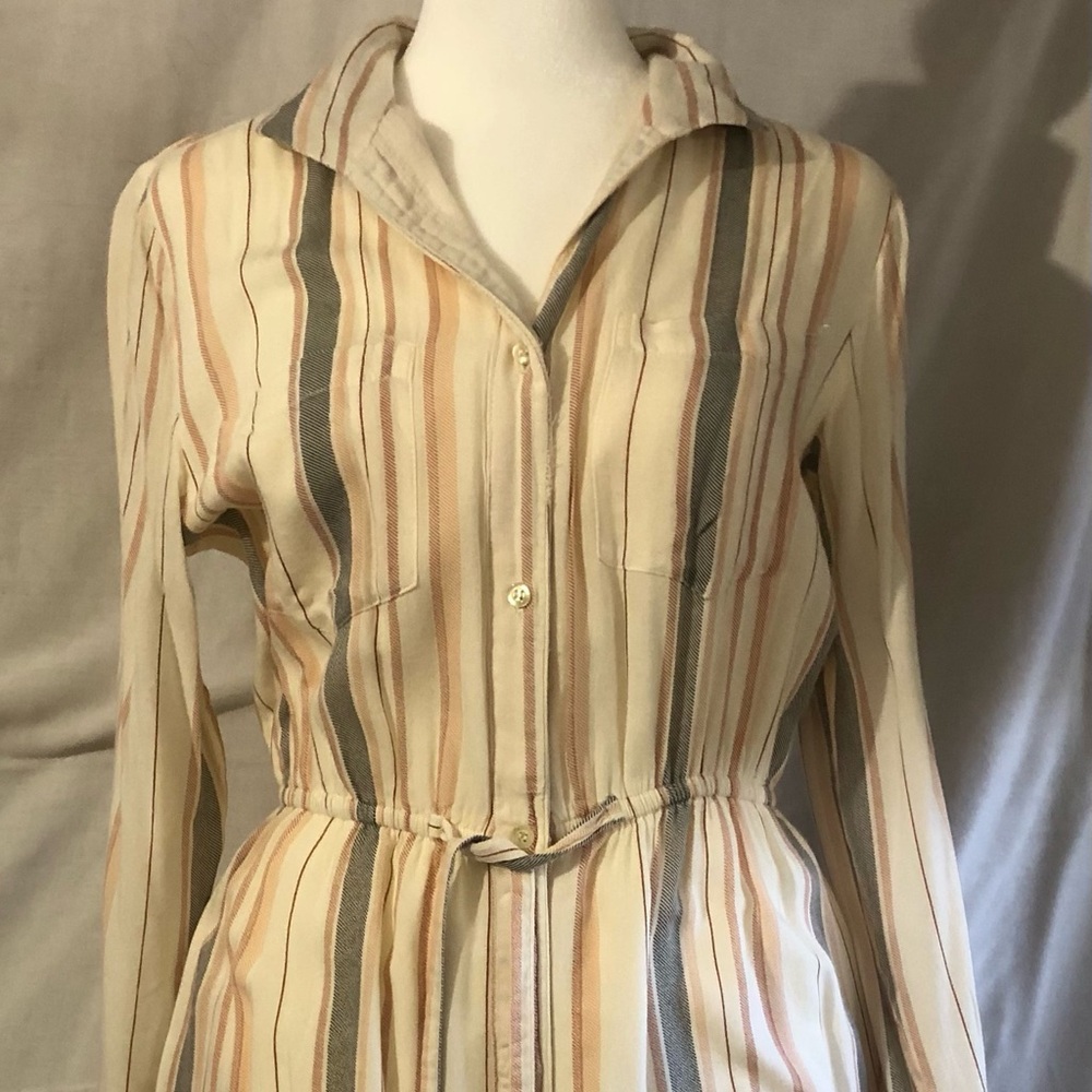 Long sleeve light weight dress. Never worn